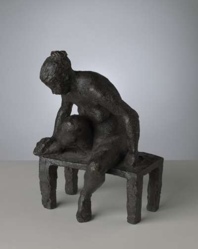 Image of Nude Seated on a Bench Holding her Right Foot