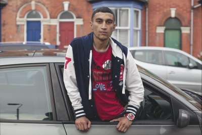 Image of Red T-Shirt, Baseball Jacket, Car