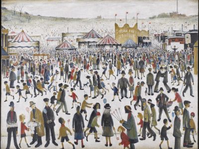 Crowd scene of people at a funfair