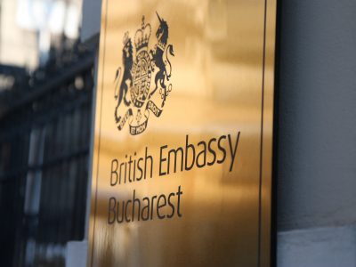 golden plaque with British coat of arms on the British Embassy building in Bucharest