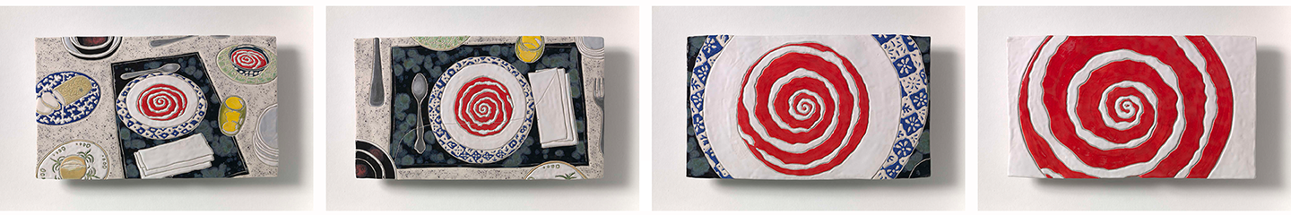 A series of four images of four ceramic artworks that look like stills from a film; in the first one, a blue and white patterned bowl of soup sits on a blue placemat, surrounded by a spoon, napkins, a glass of something yellow, another smaller bowl of soup and more food. In the second one is a close-up of the placemat and the bowl of soup, taken as if shot directly from above; in the third, we're even closer to the patterned bowl and the red spirals within the soup; in the final image, we can't see anything but the red and white spirals.