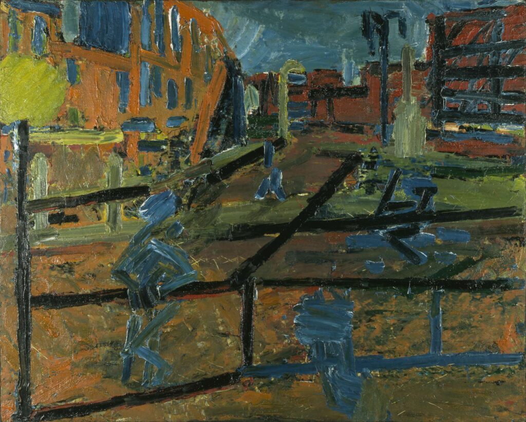 In this view of Mornington Crescent in north London, Frank Auerbach has depicted the street in his characteristically thick, buttery strokes. A pelican-crossing beacon frames the painting on the left, while schematically painted blue figures appear to stroll past heavy black railings.